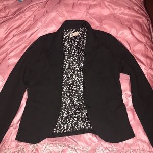 A black long sleeve blazer
